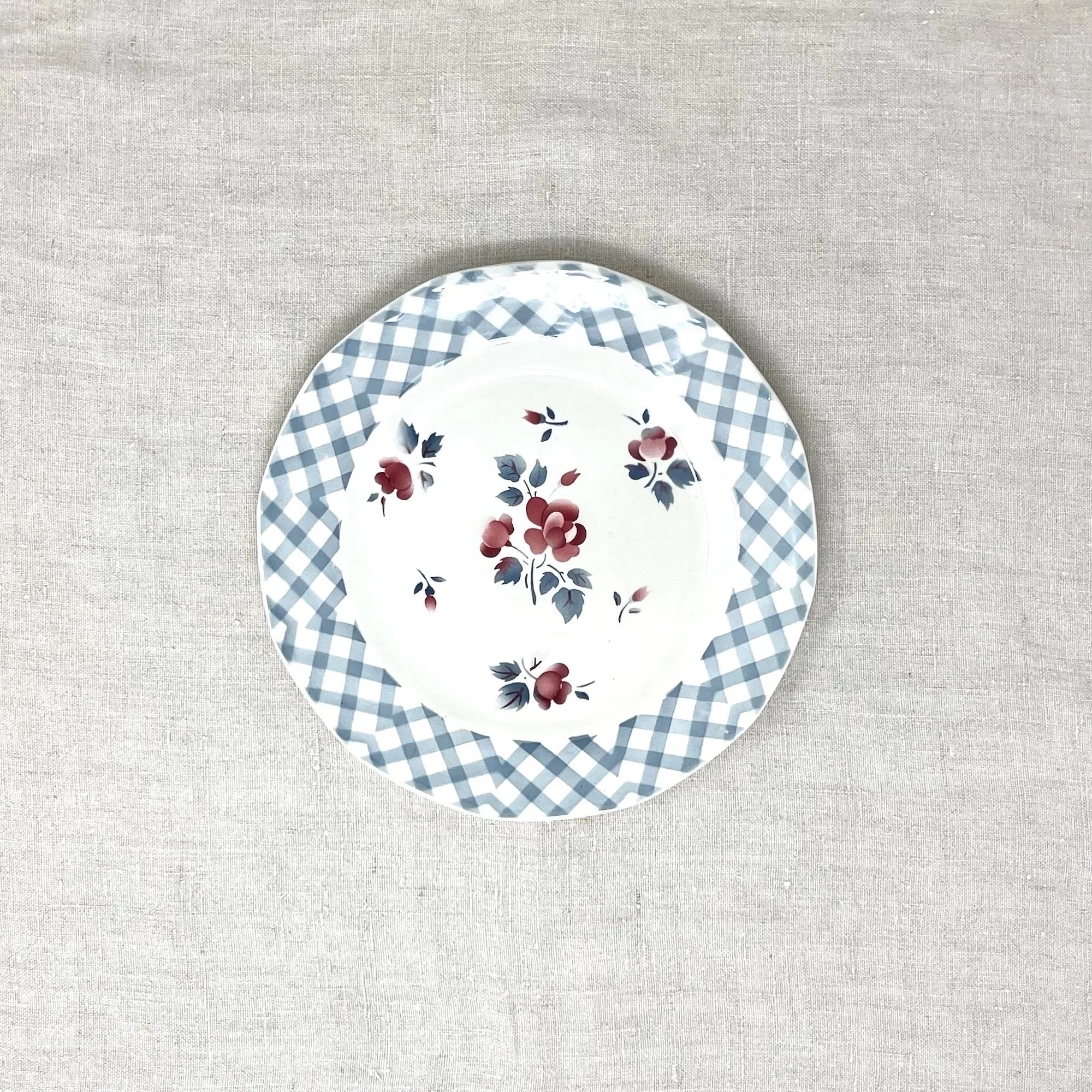 Blue checkered plate with roses